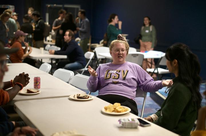 Talking over snacks before the program