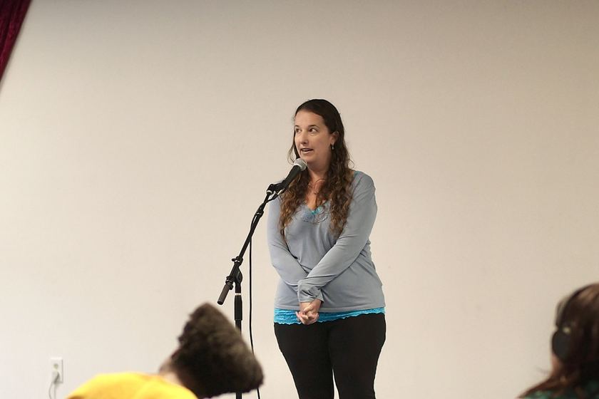 Julia Gitis at the mic