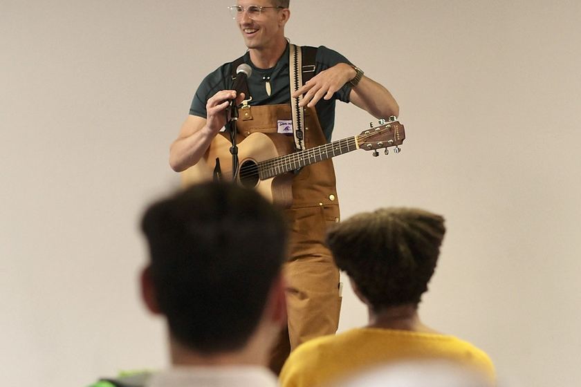 Dominic pitches an open mic