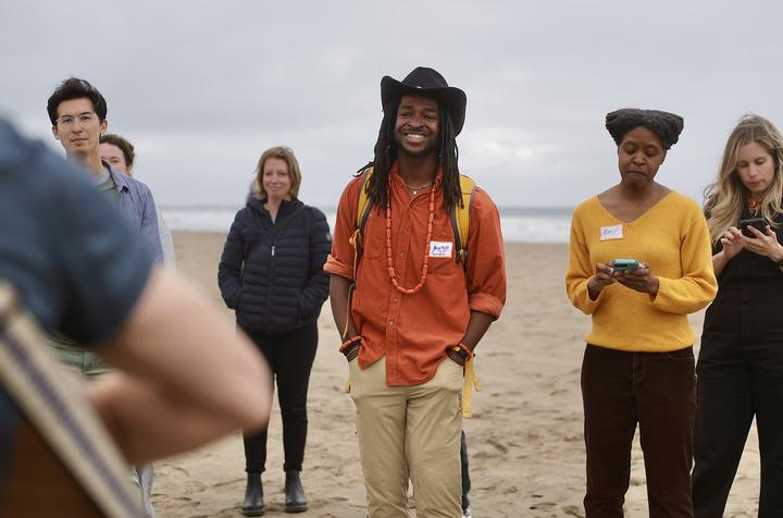 Jawno and teammates on the sand