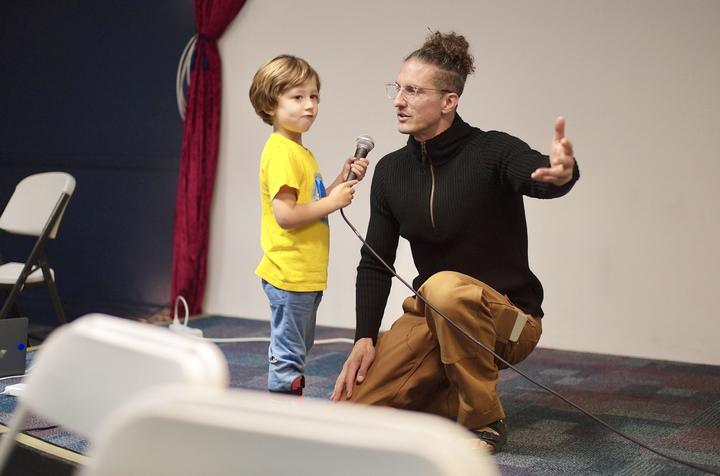 Dominic hands the mic to the youngest voice in the room