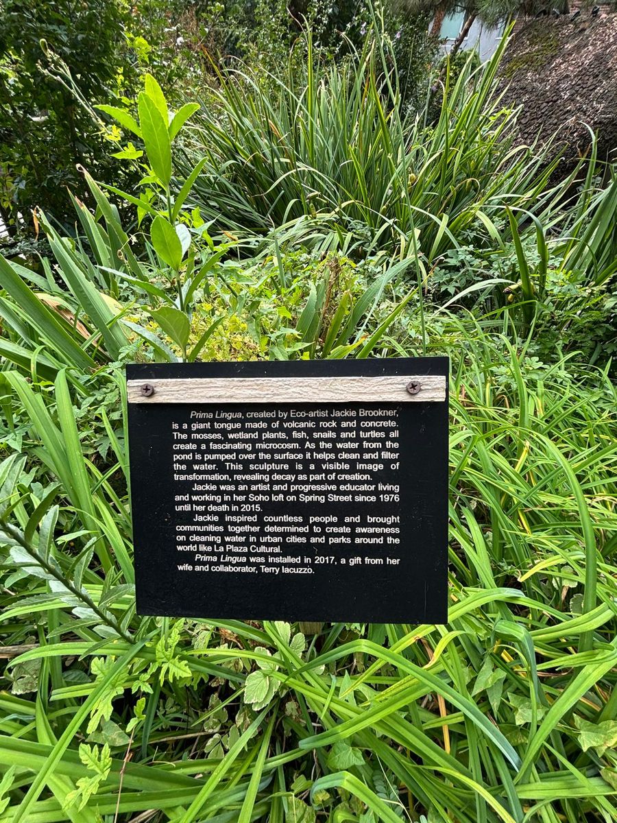 The plaque for Prima Lingua, Jackie Brookner's moss-covered tongue that filters the pond.