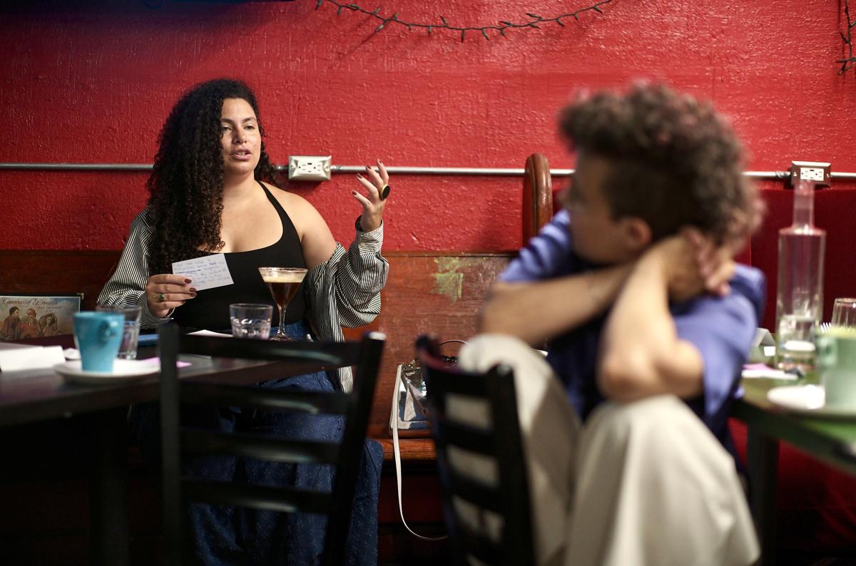 A conversation across the table in the Dream Room