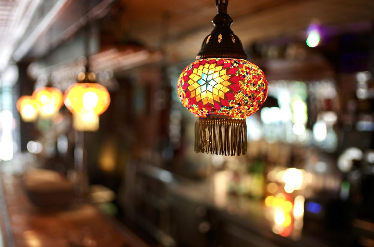 A mosaic lantern over the bar