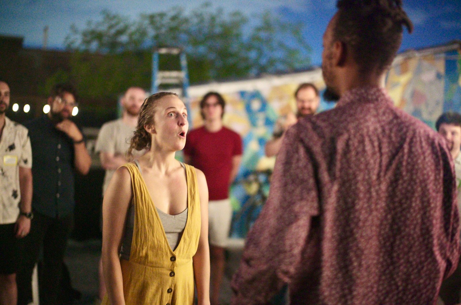 Up on the roof, a singer with eyes closed leading the call and response that opened the second half.
